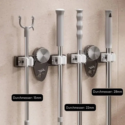 Space-saving holder for brooms and tools – Quick to install, no drilling required