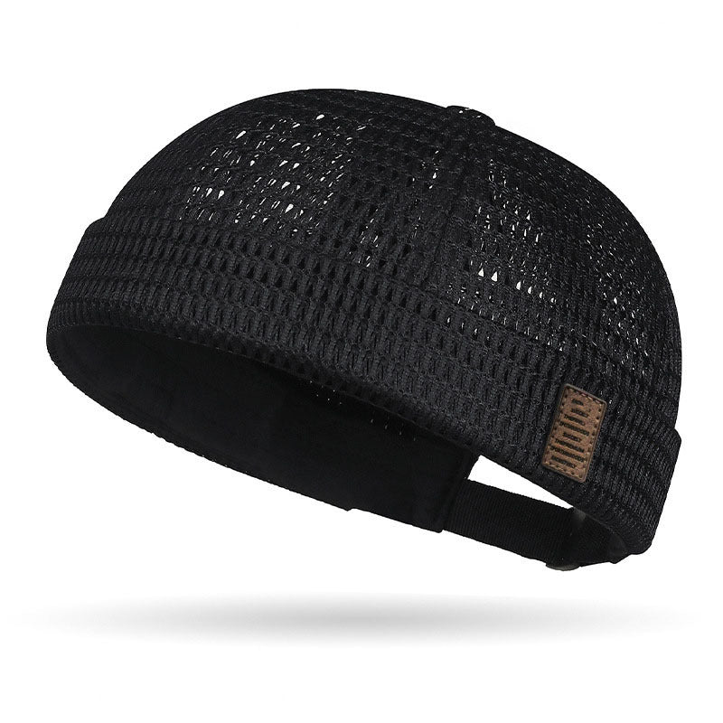 Breathable mesh cap with an adjustable strap