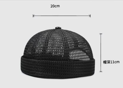 Breathable mesh cap with an adjustable strap